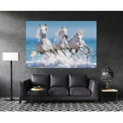 תמונת קנבס – סוסים דוהרים בים