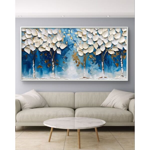 תמונת קנבס לסלון “שלג ביער” בגוונים כחול/זהב